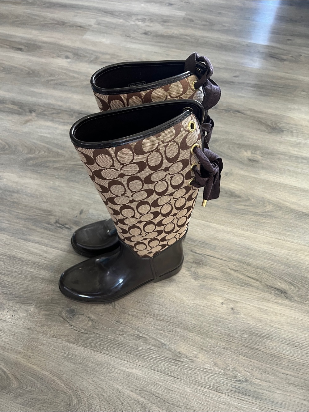 Coach Monogram Rain Boots in Brown and Tan